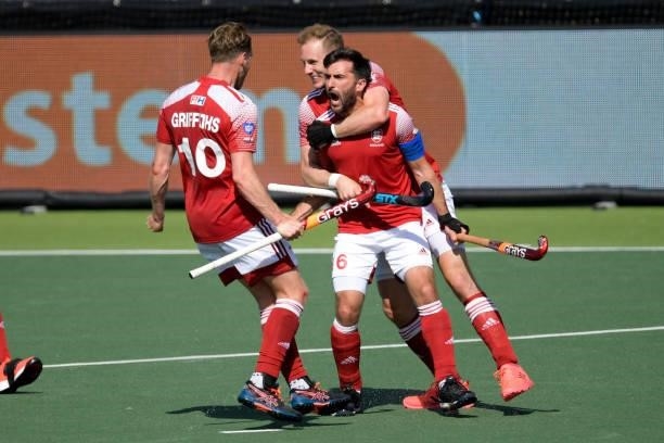 Adam Dixon of England scores first England goal during the Euro Hockey Championships match between England and Germany at Wagener Stadion on June 10,...