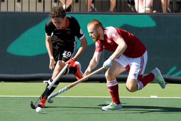 Johannes Grosse of Germany, David Ames of England during the Euro Hockey Championships match between England and Germany at Wagener Stadion on June...