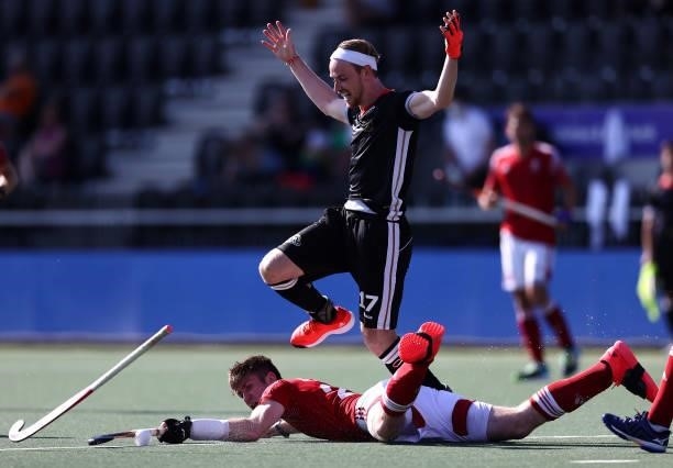 Liam Sanford of England battles for the ball with Christopher Ruehr of Germany during the Euro Hockey Championships Mens Semi Final match between...