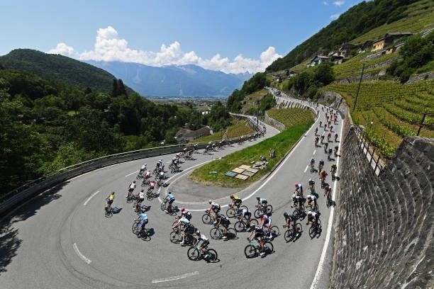 The peloton passing through Aigle vineyards landscape during the 84th Tour de Suisse 2021, Stage 5 a 175,2km stage from Gstaad to Leukerbad 1385m /...