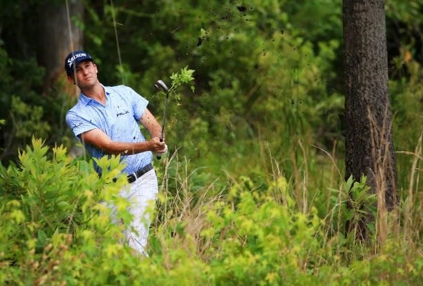 Smylie Kaufman plays his shot out of the rough on the 10th hole during the first round of the Palmetto Championship at Congaree on June 10, 2021 in...