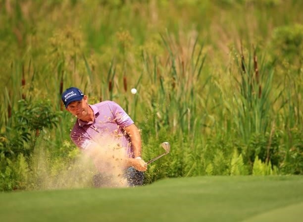 Padraig Harrington of Ireland plays his shot out of the bunker on the 10th hole during the first round of the Palmetto Championship at Congaree on...