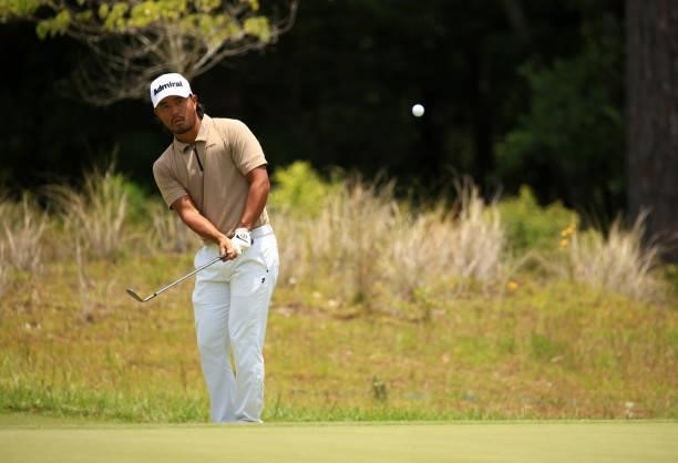 Satoshi Kodaira of Japan chips on the 11th green during the first round of the Palmetto Championship at Congaree on June 10, 2021 in Ridgeland, South...