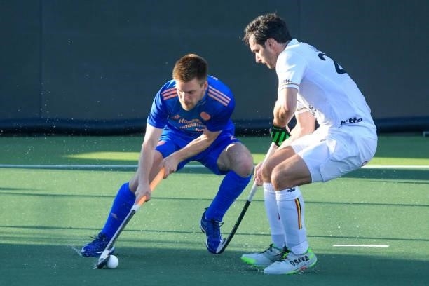 Thierry Brinkman of the Netherlands and Loick Luypaert of Belgium during the Euro Hockey Championships match between Netherlands and Belgium at...