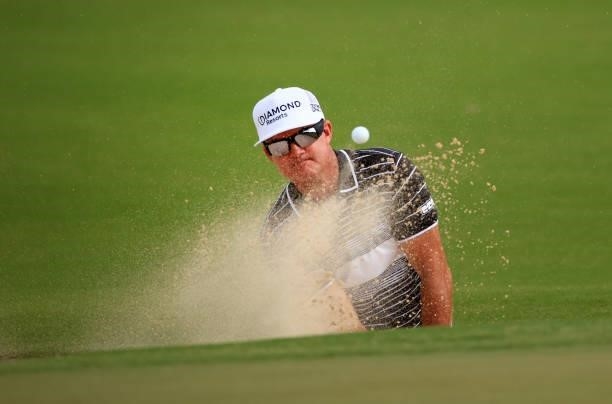 Brian Gay plays a shot from a bunker on the 12th hole during the first round of the Palmetto Championship at Congaree on June 10, 2021 in Ridgeland,...