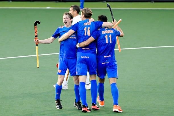 Seve van Ass of the Netherlands celebrates after scoring his sides first goal with Glenn Schuurman of the Netherlands and Mirco Pruijser of the...