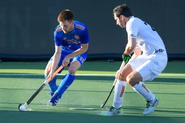Thierry Brinkman of the Netherlands and Loick Luypaert of Belgium during the Euro Hockey Championships match between Netherlands and Belgium at...