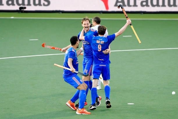 Seve van Ass of the Netherlands celebrates after scoring his sides first goal with Glenn Schuurman of the Netherlands and Mirco Pruijser of the...