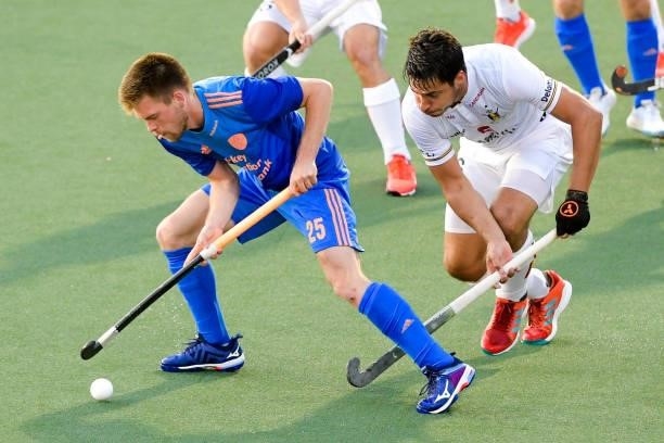 Thierry Brinkman of the Netherlands and Alexander Hendrickx of Belgium during the Euro Hockey Championships match between Netherlands and Belgium at...