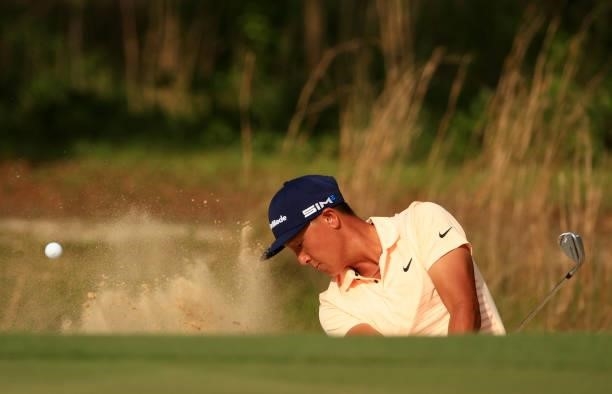 John Pak plays a shot from a bunker on the 12th hole during the first round of the Palmetto Championship at Congaree on June 10, 2021 in Ridgeland,...