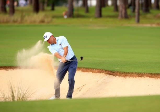 Rob Oppenheim plays a shot from a bunker on the 12th hole during the first round of the Palmetto Championship at Congaree on June 10, 2021 in...