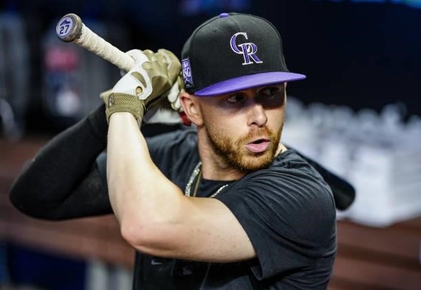 Trevor Story of the Colorado Rockies warms up during batting practice prior to the game against the Miami Marlins at loanDepot park on June 10, 2021...