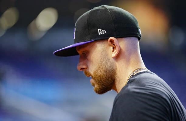 Trevor Story of the Colorado Rockies looks on during batting practice prior to the game against the Miami Marlins at loanDepot park on June 10, 2021...