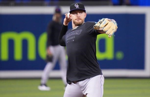 Trevor Story of the Colorado Rockies fields the ball during batting practice prior to the game against the Miami Marlins at loanDepot park on June...