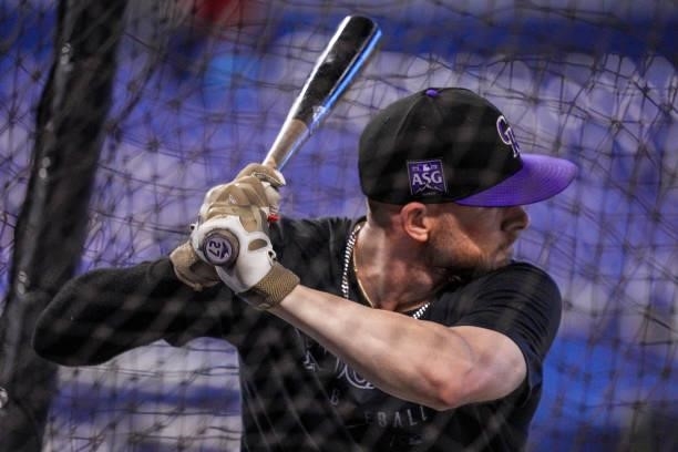 Trevor Story of the Colorado Rockies warms up during batting practice prior to the game against the Miami Marlins at loanDepot park on June 10, 2021...