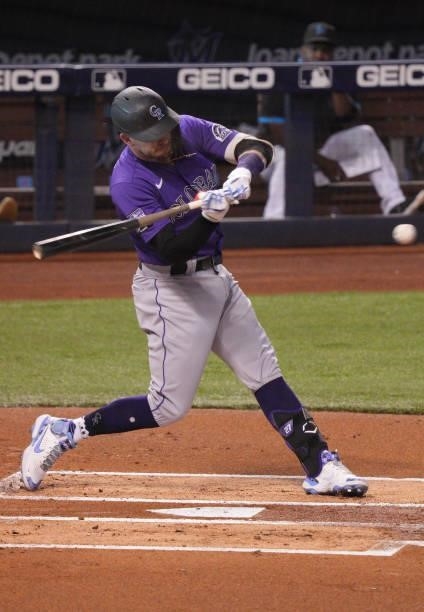 Trevor Story of the Colorado Rockies bats in the first inning against the Miami Marlins at loanDepot park on June 10, 2021 in Miami, Florida.
