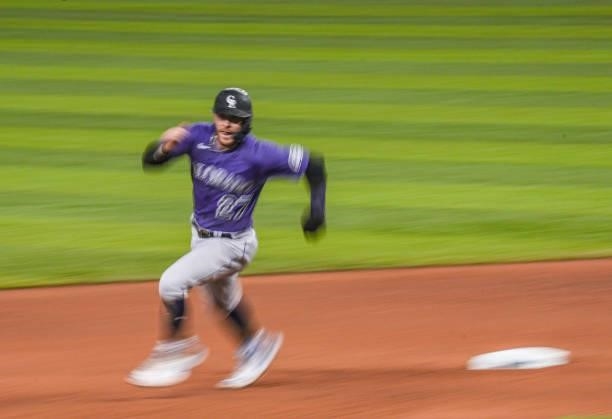 Trevor Story of the Colorado Rockies runs the bases in the seventh inning against the Miami Marlins at loanDepot park on June 10, 2021 in Miami,...