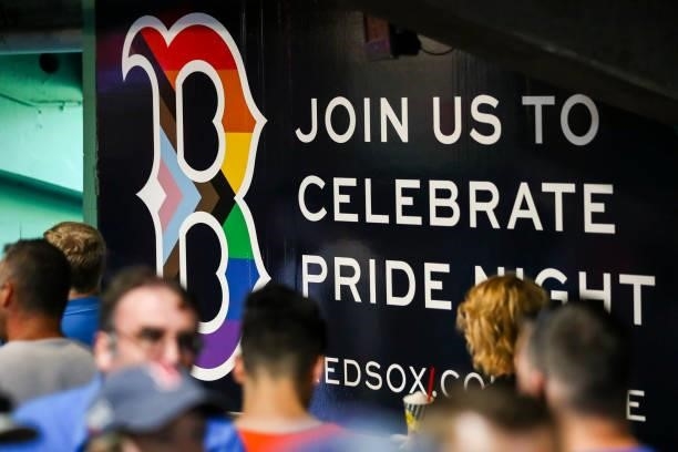 Pride Night banner hangs in the concourse as walk by before a game between the Boston Red Sox and the Houston Astros at Fenway Park on June 10, 2021...