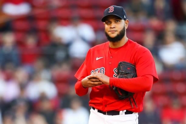 Eduardo Rodriguez of the Boston Red Sox reacts after giving up a home run during a game against the Houston Astros at Fenway Park on June 10, 2021 in...