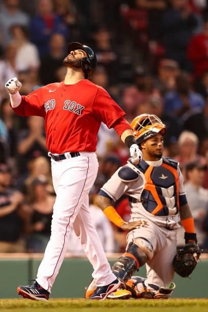 Martinez of the Boston Red Sox reacts as he crosses home plate after hitting a solo home run in the third inning of a game against the Houston Astros...