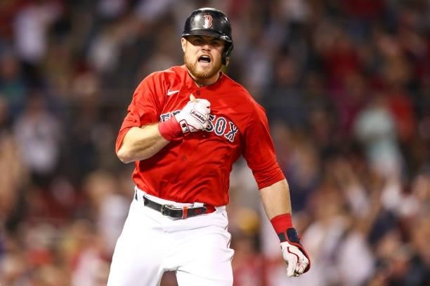 Christian Arroyo of the Boston Red Sox reacts after hitting a three-run home run in the fifth inning of a game against the Houston Astros at Fenway...