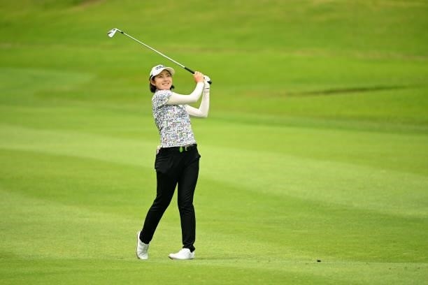 Rie Tsuji of Japan hits her second shot on the 9th hole during the second round of the Ai Miyazato Suntory Ladies Open at Rokko Kokusai Golf Club on...
