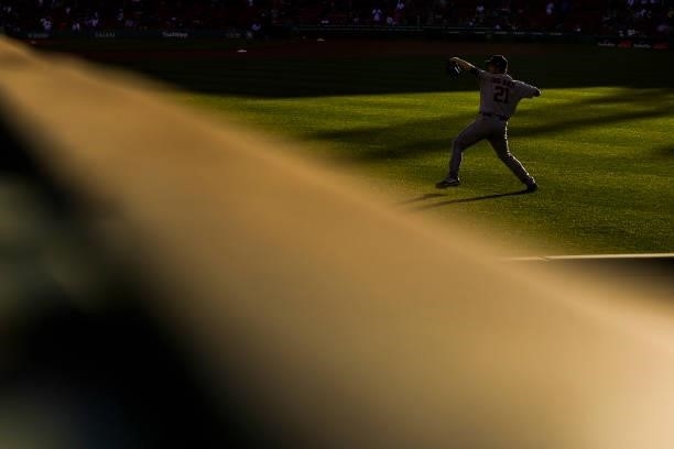 Zack Greinke of the Houston Astros warms up in the outfield before a game against the Boston Red Sox at Fenway Park on June 10, 2021 in Boston,...