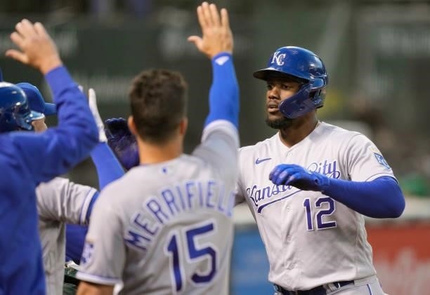 Jorge Soler of the Kansas City Royals is congratulated by teammates after scoring against the Oakland Athletics in the top of the seventh inning at...