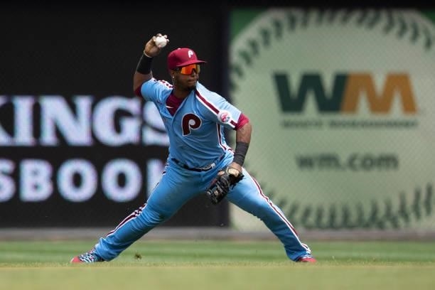 Jean Segura of the Philadelphia Phillies throws the ball to first base against the Atlanta Braves at Citizens Bank Park on June 10, 2021 in...