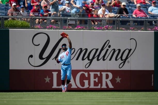 Andrew McCutchen of the Philadelphia Phillies catches the ball against the Atlanta Braves at Citizens Bank Park on June 10, 2021 in Philadelphia,...