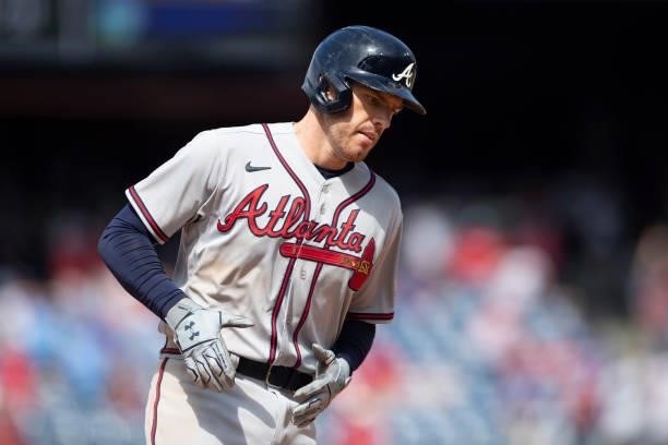 Freddie Freeman of the Atlanta Braves rounds the bases after hitting a solo home run in the top of the ninth inning against the Philadelphia Phillies...