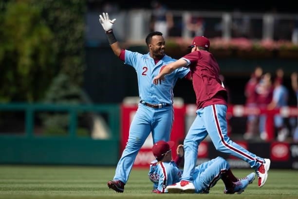 Jean Segura of the Philadelphia Phillies celebrates with Ronald Torreyes after hitting a walk-off two RBI single in the bottom of the tenth inning...
