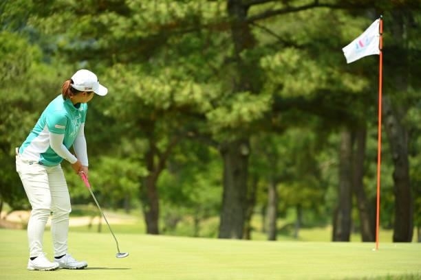 Mao Saigo of Japan holes the birdie putt on the 4th green during the second round of the Ai Miyazato Suntory Ladies Open at Rokko Kokusai Golf Club...