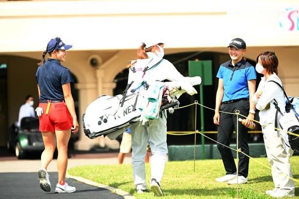 Amateurs Akie Iwai and Chisato Iwai of Japan talk during the second round of the Ai Miyazato Suntory Ladies Open at Rokko Kokusai Golf Club on June...