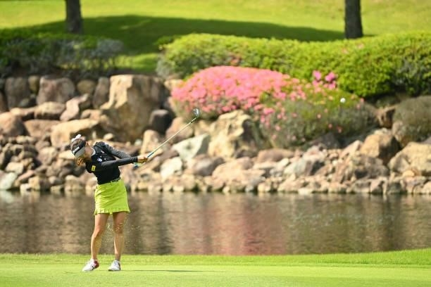 Reika Usui of Japan plays a short on the 18th hole during the second round of the Ai Miyazato Suntory Ladies Open at Rokko Kokusai Golf Club on June...