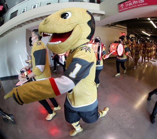 The Vegas Golden Knights mascot Chance the Golden Gila Monster, members of the Golden Knights Knight Line Drumbots and the Golden Knights Vegas...