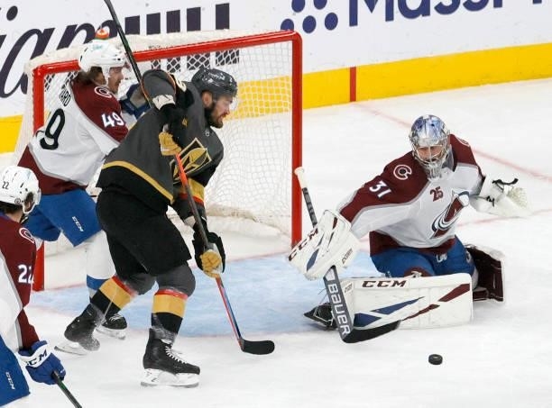 William Carrier of the Vegas Golden Knights scores a third-period goal against Philipp Grubauer of the Colorado Avalanche in Game Six of the Second...