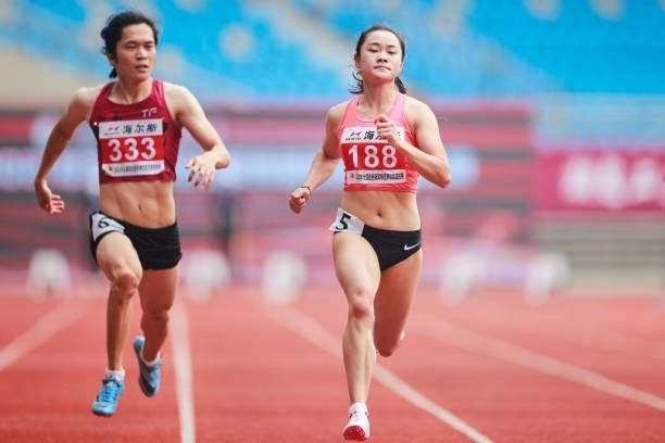 Liang Xiaojing of Guangdong competes in the Women's 100 Metres heats on day one of 2021 Chinese National Athletics Championships & Tokyo Olympic...