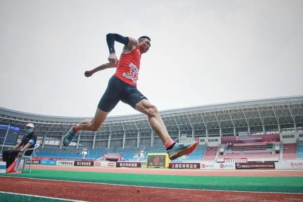 Zhu Yaming of Liaoning competes in the Men's Triple Jump Final on day one of 2021 Chinese National Athletics Championships & Tokyo Olympic Trials at...