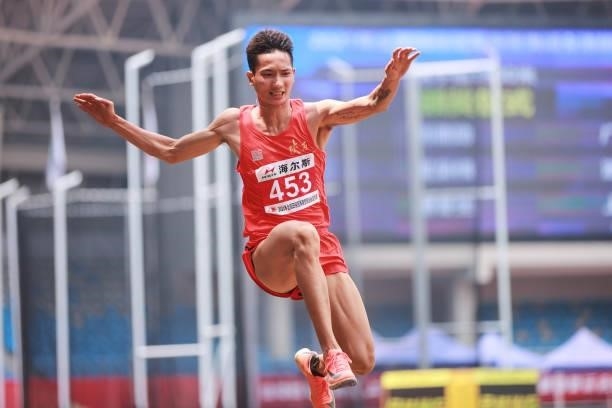 Fang Yaoqing of Shaanxi competes in the Men's Triple Jump Final on day one of 2021 Chinese National Athletics Championships & Tokyo Olympic Trials at...
