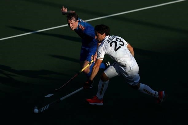 Arthur De Sloover of Belgium battles for the ball with Seve van Ass of Netherlands during the Euro Hockey Championships Mens Semi Final match between...