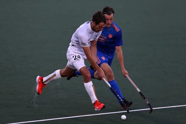 Antoine Kina of Belgium battles for the ball with Jorrit Croon of Netherlands during the Euro Hockey Championships Mens Semi Final match between...
