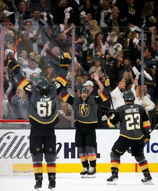 Mark Stone, Max Pacioretty and Alec Martinez of the Vegas Golden Knights celebrate Pacioretty's third-period empty-net goal against the Colorado...