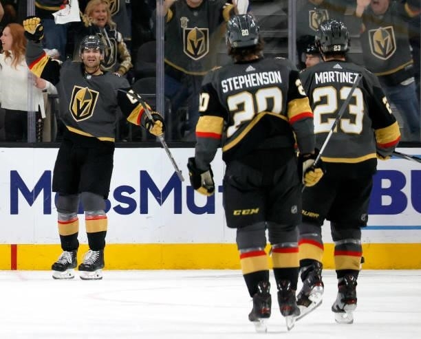 Max Pacioretty, Chandler Stephenson and Alec Martinez of the Vegas Golden Knights celebrate Pacioretty's third-period empty-net goal against the...