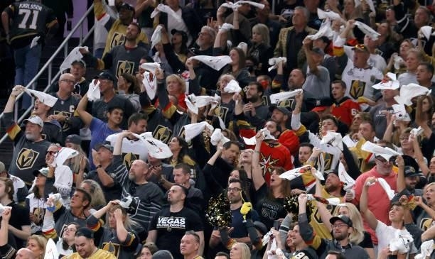 Vegas Golden Knights fans celebrate after a first-period goal by William Karlsson of the Golden Knights against the Colorado Avalanche in Game Six of...