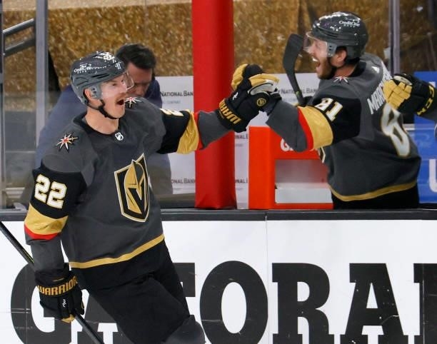 Nick Holden of the Vegas Golden Knights celebrates with Jonathan Marchessault on the bench after Holden scored a first-period goal against the...