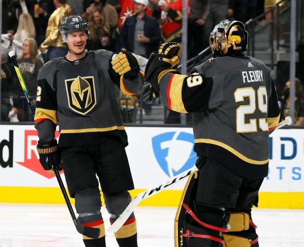 Nick Holden and Marc-Andre Fleury of the Vegas Golden Knights celebrate Holden's first-period goal against the Colorado Avalanche in Game Six of the...