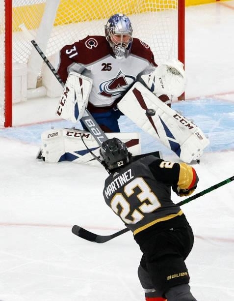 Philipp Grubauer of the Colorado Avalanche blocks a shot by Alec Martinez of the Vegas Golden Knights in the first period in Game Six of the Second...