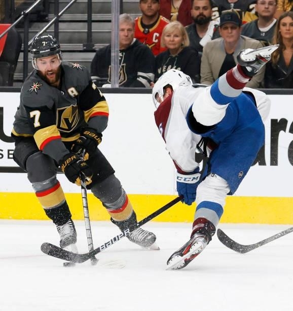 Mikko Rantanen of the Colorado Avalanche tries to steal the puck from Alex Pietrangelo of the Vegas Golden Knights in the first period in Game Six of...