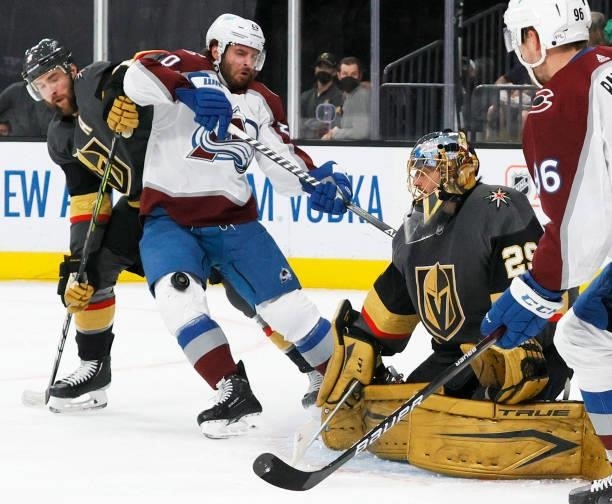 Marc-Andre Fleury of the Vegas Golden Knights defends the net against Brandon Saad of the Colorado Avalanche as Alex Pietrangelo of the Golden...